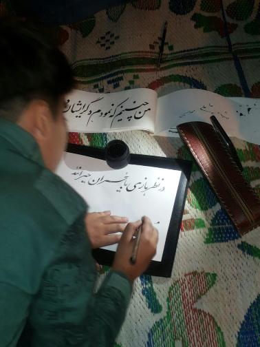 گزارش تصویری از ایستگاه خوشنویسی بسیجیان در پارک کشاورز کوهدشت