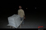 فعالیت جهادگران در شب برای اتمام خانه محروم در گنبد سه پایه در شهرستان دلگان