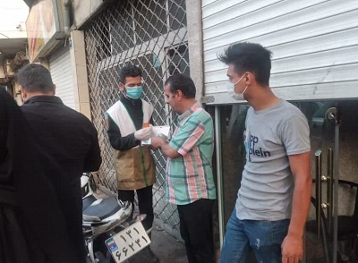 توزیع ماسک و بروشور در بین اهالی ناحیه مالک اشتر