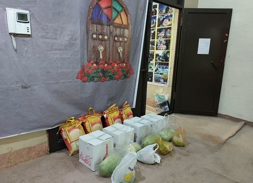 توزیع بسته های ارزاق بین نیازمندان ویژه شب یلدا