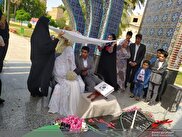 برگزاری آیین جشن عقد زوج جوان جویباری در جوار شهدای گمنام