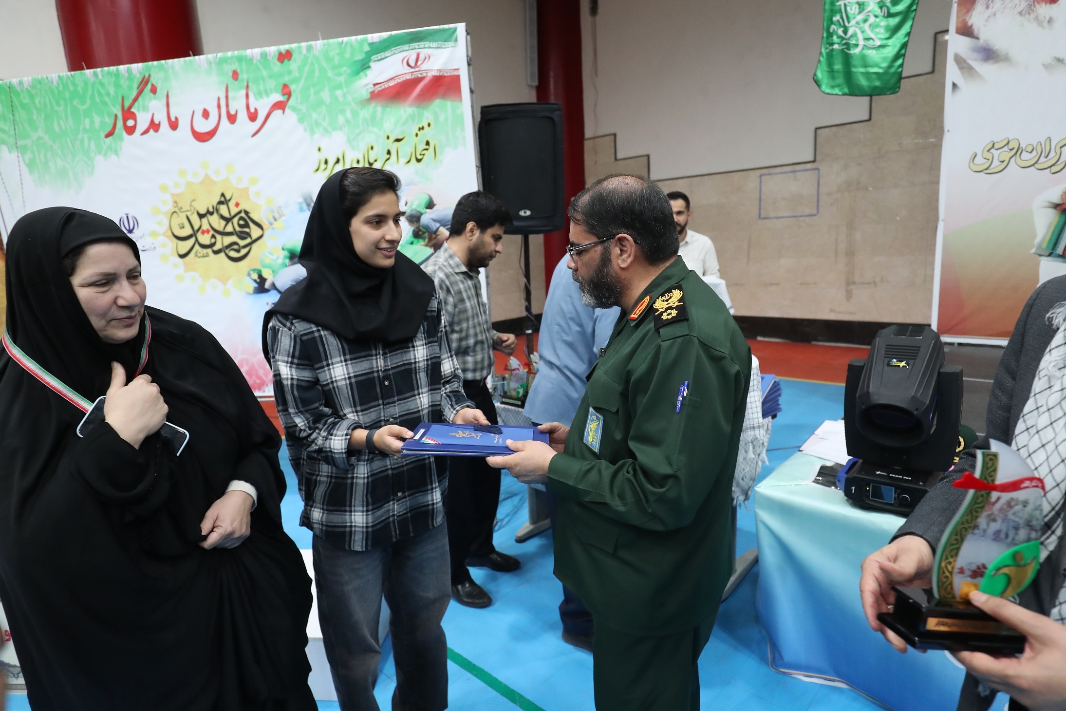 گزارش تصویری از اولین مراسم تجلیل از قهرمانان ملی‌پوش خانواده شهدا، ایثارگران و رزمندگان