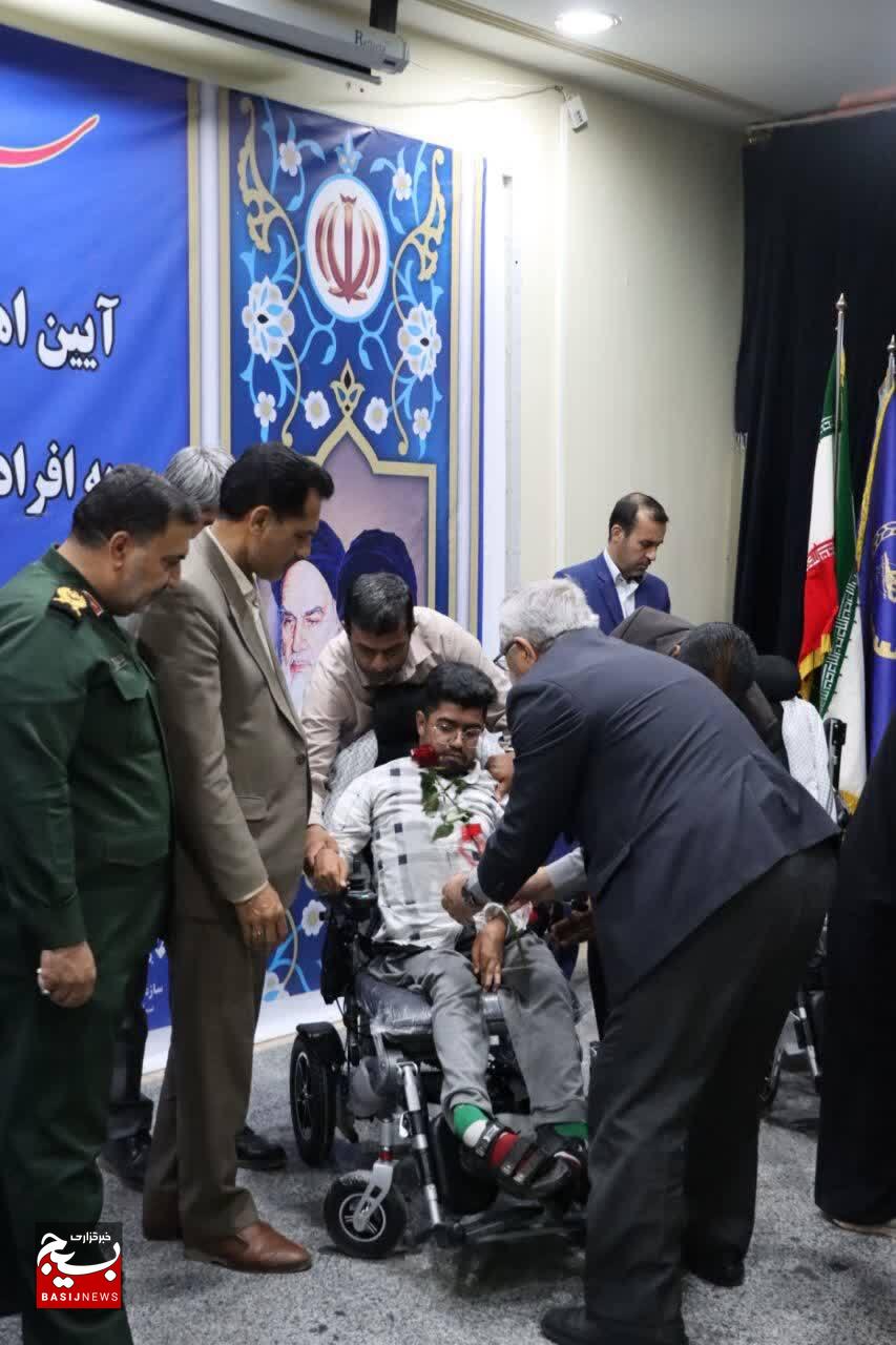 آیین واگذاری ۹۶ ویلچر برقی با حضور سردار حزنی