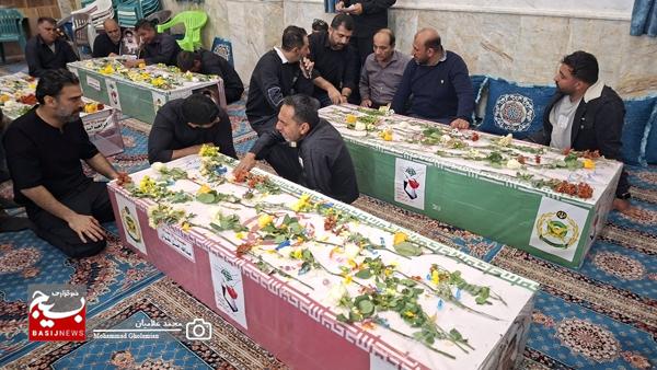 وداع با پیکر ۹ شهید پدافند سیراف در کنگان