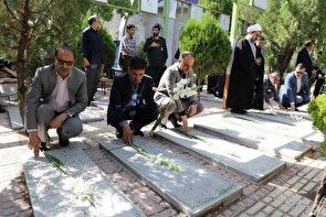  قبور مطهر شهدای کلانشهر اراک گلباران شد