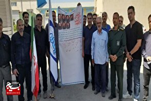 امضاء عهدنامه با شهدا توسط بسیجیان کارخانجات استان همدان