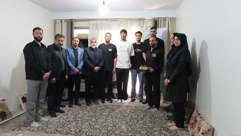 دیدار جمعی از جامعه ورزش با خانواده شهید ورزشکار مهدی پولادوند