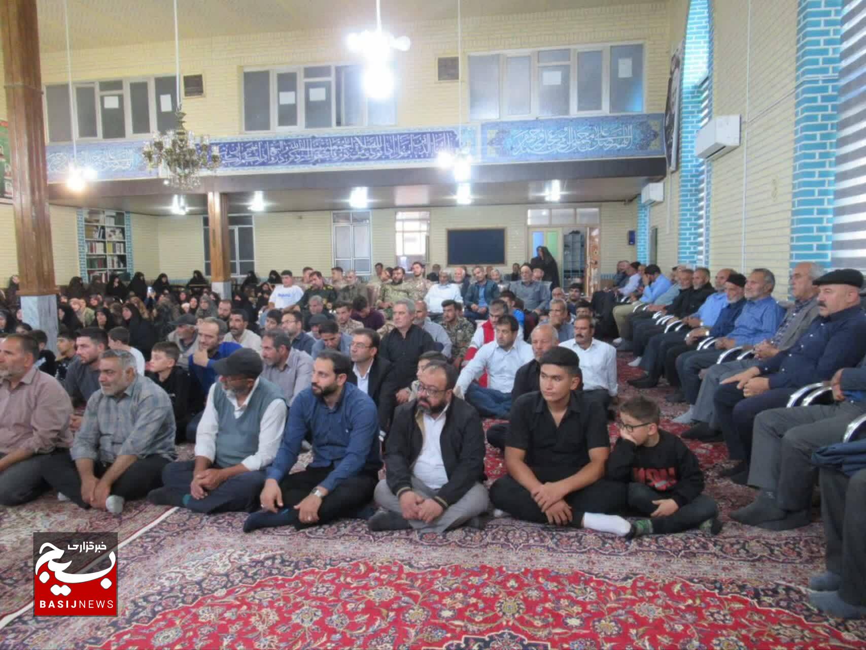 برگزاری یادواره شهدای جنگ ۱۲ روزه در روستای سرای بخش ایلخچی 