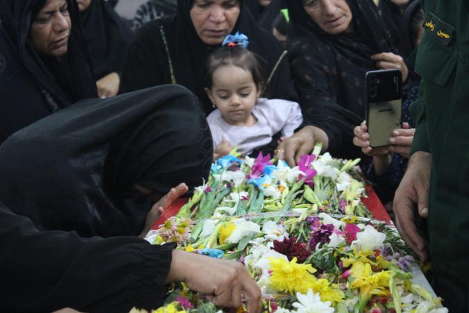 گوشه‌هایی از مراسم استقبال از شهید گمنام در بخش ساحلی دلوار