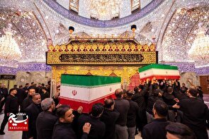 پیکرهای مطهر امام شهید و خانواده ایشان در جوار ضریح مطهر حضرت ابالفضل العباس (علیه‌السلام)