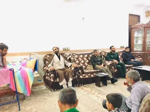 فرمانده حوزه مقاومت بسیج روح الله با جانبار دفاع مقدس دیدار کرد