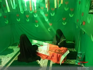 نمایشگاه هفته دفاع مقدس در پایگاه بسیج مسجد مسکن مهر شاندیز