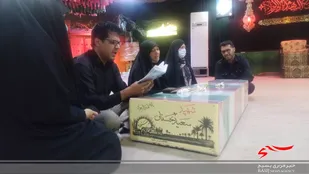 بازگشت پیکر شهید حسنان در نبود پدر و مادر+تصاویر