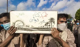 خاکسپاری پیکر پاک یک شهید گمنام در بندرعباس به روایت تصویر