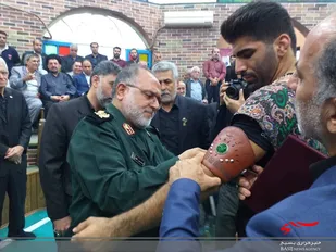 بازوبند پهلوانی بسیج کشور بر بازوان &laquo;سینا غلامی&raquo; بسته شد