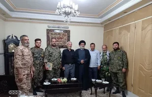تجلیل از خانواده شهید عابدین زاده  در هفته وحدت
