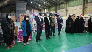 پهلوان مردان بسیج ورزشکاران قزوین، دو زوج جوان را راهی خانه بخت کردند