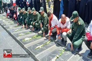 آیین عطرافشانی و غبارروبی مزار مطهر شهدای ملایر