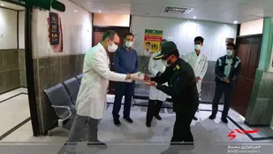 تقدیر از کادر درمان و پرستاران درمانگاه امام حسن عسکری (ع) شهرستان بینالود