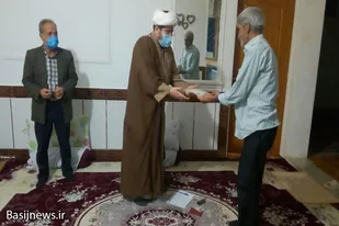 تقدیر از ایثارگران در روستای توانه نهاوند