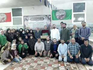 پرچم حرم حضرت زینب به اعضای موکب زینبیون قزوین اهدا شد