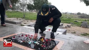 غبار روبی از گلزار شهید ماندنی اکبرپا از شهدای انقلاب در بخش دلوار
