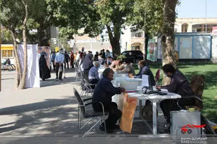 برگزاری میز خدمت به مناسبت هفته دفاع مقدس+تصاویر