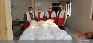 توزیع 400 پرس غذا رایگان بین نیازمندان روستا بختیار نظرآباد+تصاویر