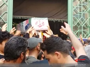 وداع با پیکر مطهر شهید عباس آسمیه در مسجد حضرت معصومه(س) کرج برگزار شد