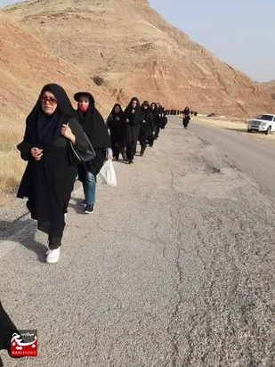 پیاده روی بانوان بسیجی به مناسبت روز مقاومت و پایداری دزفول در شهرستان لالی