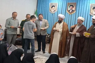 تجلیل از دانش آموزان حافظ قرآن کریم در فامنین