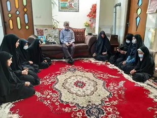 تجلیل از خانواده&zwnj;های شهید زارع و فلاح میبدی