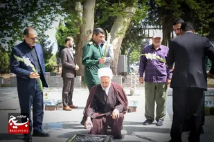 آئین عطرافشانی مزار شهید بهرامی در روستاى ولشكلاء