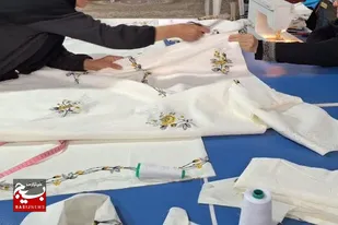 دوخت جهادی پرده توسط جهادگران بسیجی سرخه