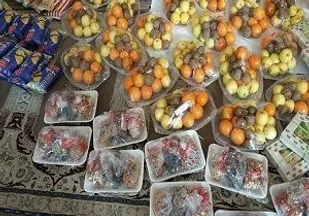 توزیع بسته معیشتی ویژه شب یلدا و غذای گرم در بین خانواده های نیازمند