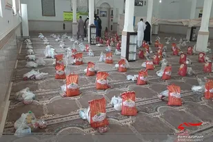 توزیع ۲۵۰ بسته  مواد غذایی بین نیازمندان دلگان