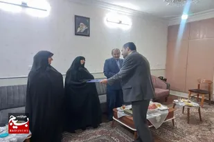 دیدار مدیر جهادکشاورزی سرخه با با خانواده شهید جهادگر