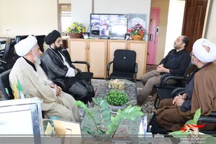 دیدار مسئول دفتر نمایندگی ولی فقیه در سپاه کربلا با خانواده شهدای روحانی