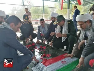 گلزار شهدای شهرستان کارون غبار روبی و عطر افشانی شد