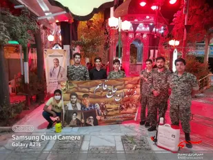 عطرافشانی قبور شهدای گلزار علی ابن جعفر توسط بسیجیان پایگاه ثقلین