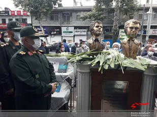 محل ترور شهیدان "انصاری" و "نورانی" در رشت گلباران شد