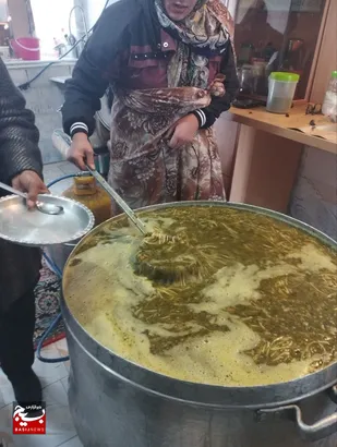 پخش آش رشته نذری در چلیچه