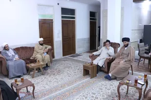 تجلیل از جانباز و استاد حوزه علمیه در یزد