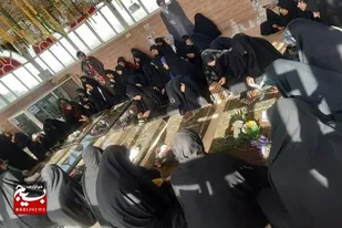 وداع دانش آموزان دختر خورموجی با شهدای گمنام اردوگاه مارد