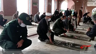 عطرافشانی مزار شهدا در عباس آباد +تصاویر