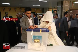 حضور عروس و داماد همدانی در پای صندوق رای