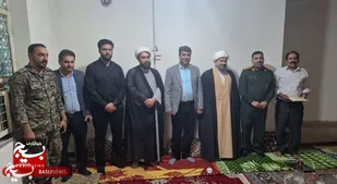 تجدید میثاق فرمانده ناحیه مقاومت بسیج گتوند با رزمنده و جانباز دفاع مقدس