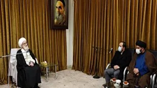 فرزند شهید فخری زاده با آیت الله نوری همدانی دیدار کرد
