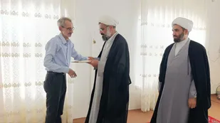 تکریم خانواده شهید &laquo;رحیم کتوکی&raquo; شهید جنگ رمضان در گمیشان