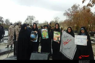 عطرافشانی مزار شهدای شهرستان بهار